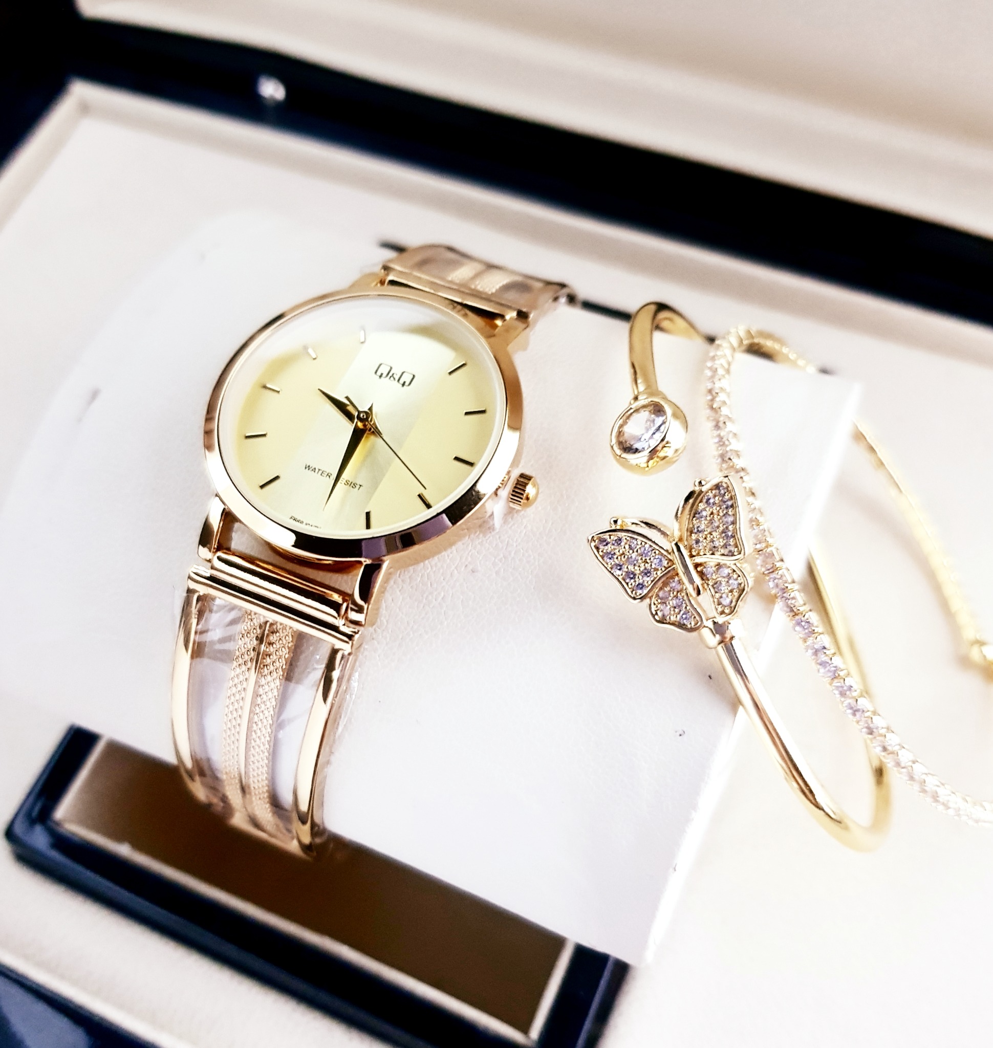 Q&Q Mariposa Champagne · Ref. DM-48 · vista 1